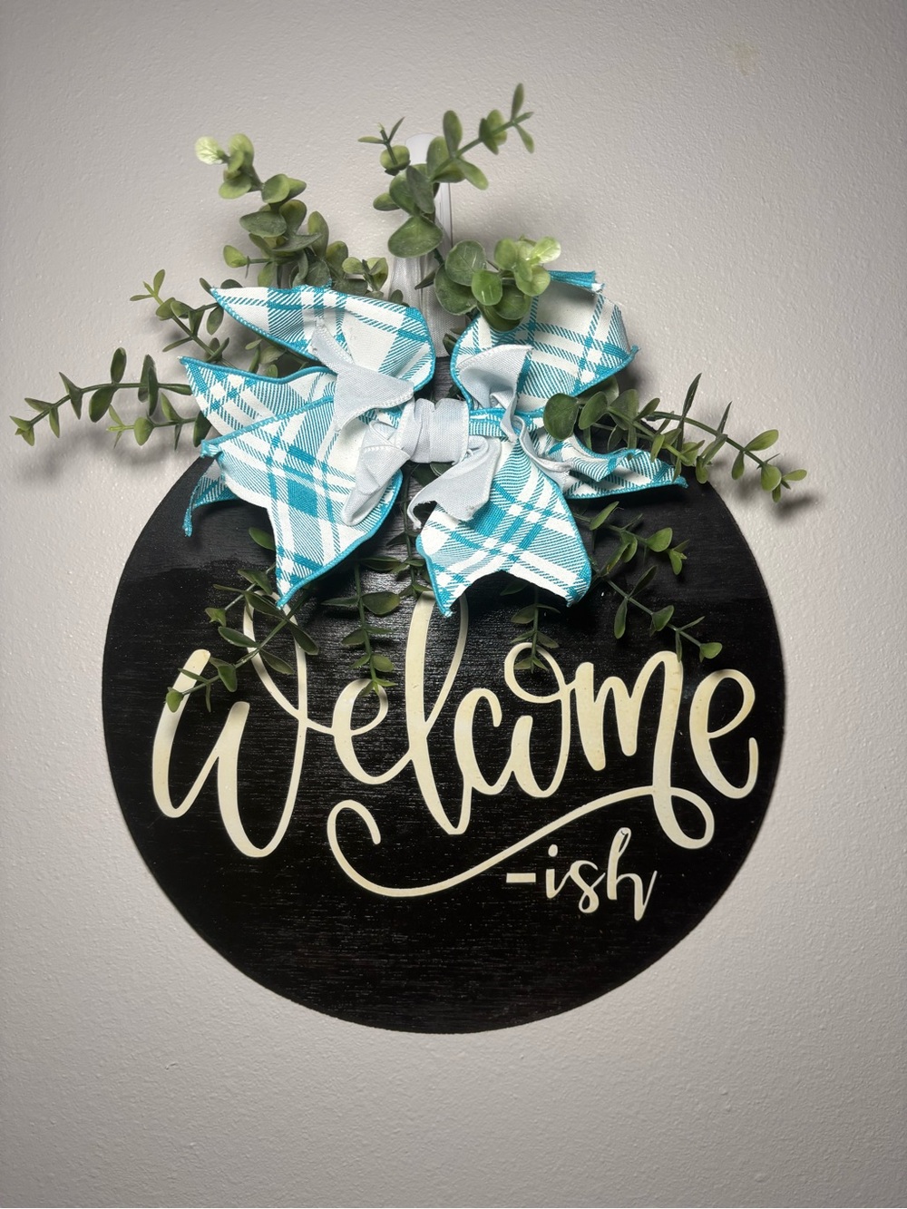 Welcome-ish Round Wall Sign with Teal Plaid Bow